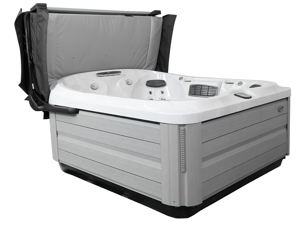 Jacuzzi hot tub with cover lift open