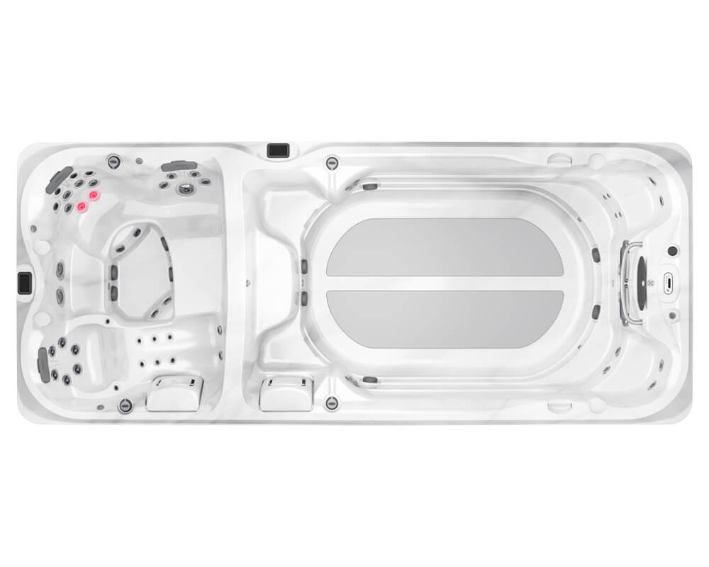 Top-down view of a white outdoor hot tub with multiple seating areas and jet clusters in each seat area.